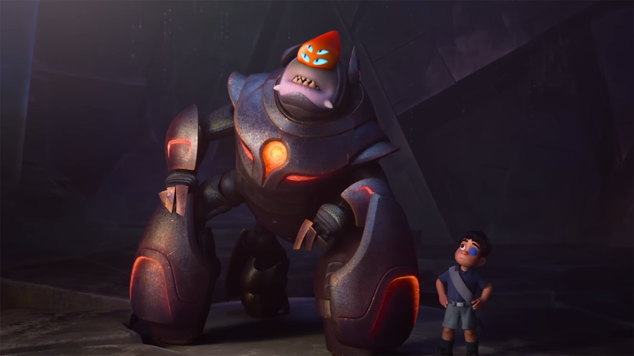 Screenshot from the animated sci-fi movie Elio. A large gorilla-like alien wearing armor is standing next to a young boy who has a blue eye patch and a sash.