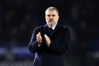 Tottenham manager Ange Postecoglou, applauds the fans after defeat to Brighton & Hove Albion during the Premier League match between Brighton & Hove Albion and Tottenham Hotspur at American Express Community Stadium on December 28, 2023 in Brighton, England. (Photo by Bryn Lennon/Getty Images)