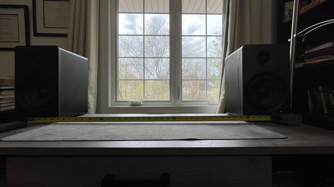 Fluance Ai61 stereo speakers on a desk, three feet apart