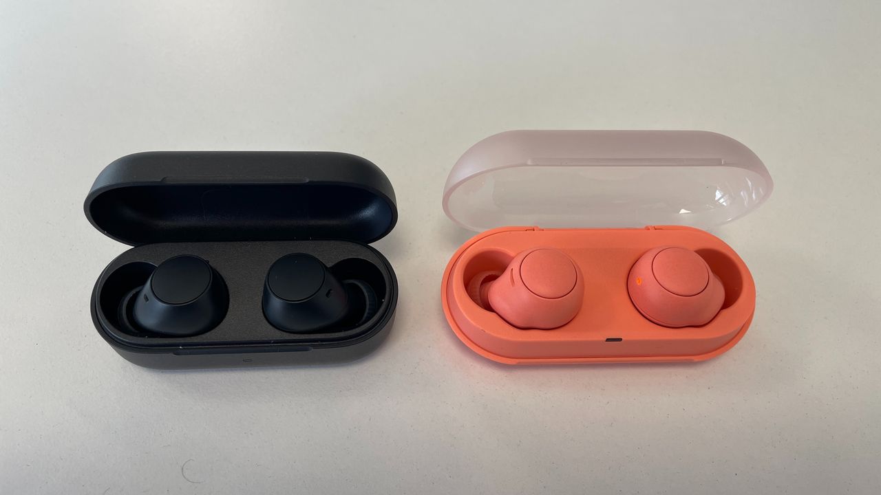 Sony WF-C510 in black and Sony WF-C500 in coral next to each other