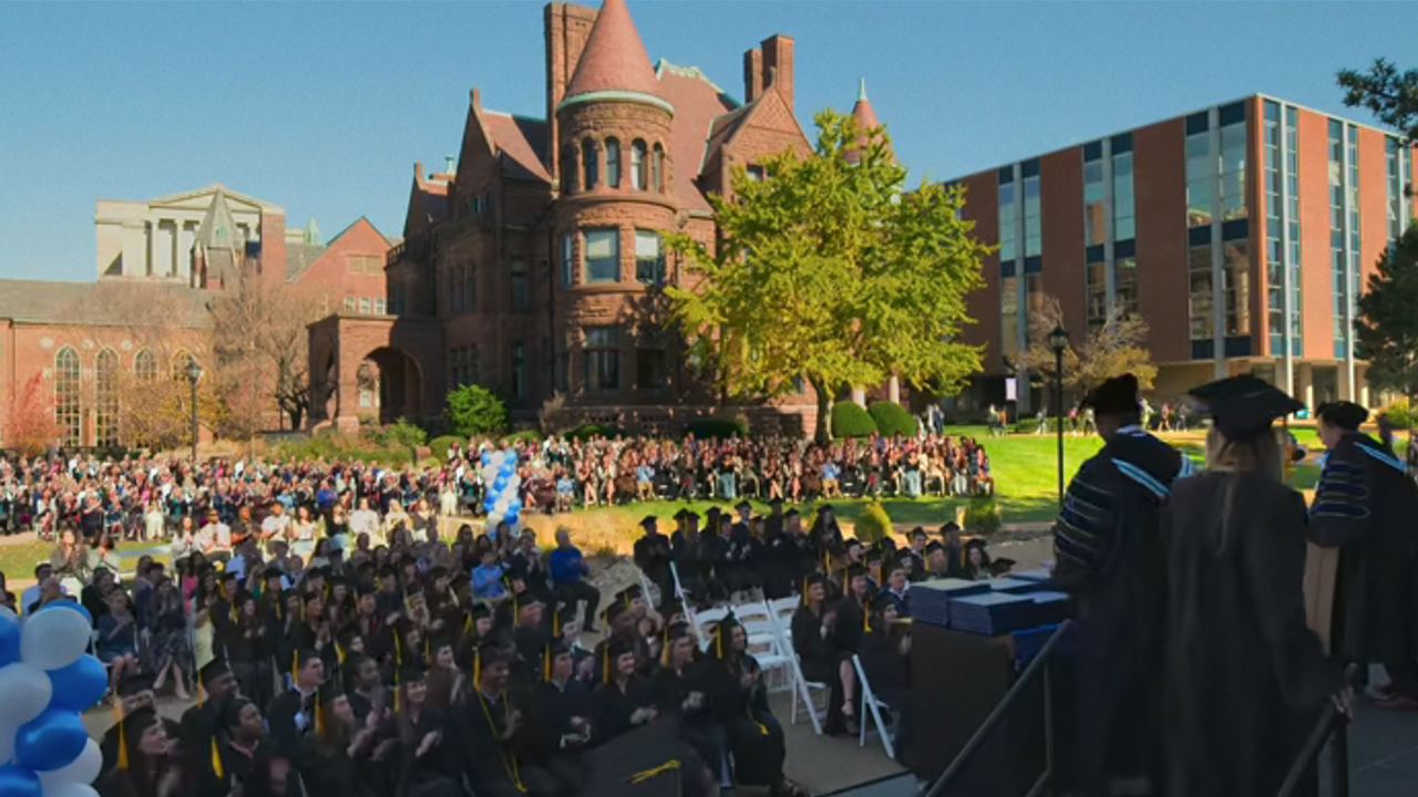 A graduation ceremony on the campus of St. Louis University in Soul on Fire.