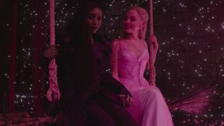 Elphaba (Cynthia Erivo) and Glinda (Ariana Grande) sit together in Wicked: For Good.
