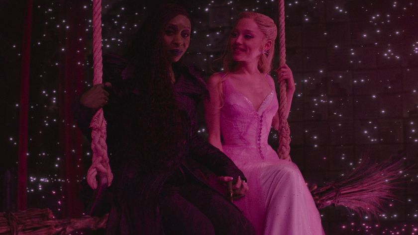Elphaba (Cynthia Erivo) and Glinda (Ariana Grande) sit together in Wicked: For Good.