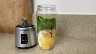 Nutribullet Go filled with smoothie ingredients