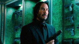 Keanu Reeves with a gun in John Wick Chapter 3: Parabellum