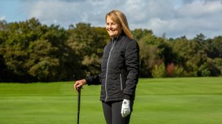 Golfer wears Pure Golf Bronwyn Quilted Jacket