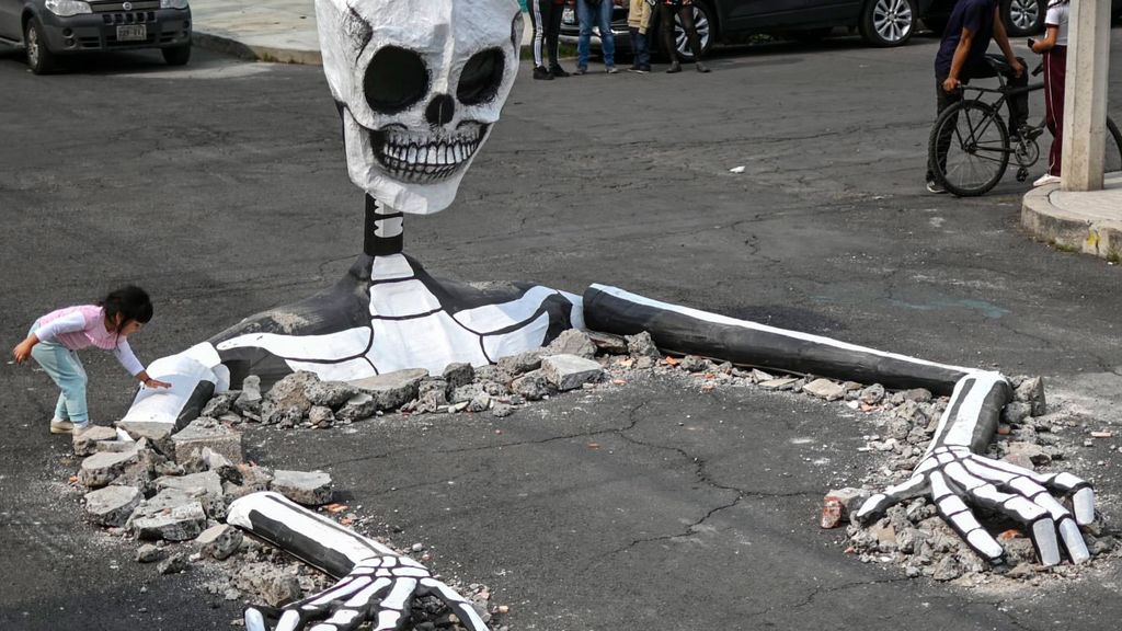 Giant skeleton sculptures 'rise up' in Mexico City Creative Bloq