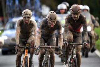 ROUBAIX FRANCE OCTOBER 03 Mathieu Van Der Poel of Netherlands and Team AlpecinFenix covered in mud competes in the breakaway during the 118th ParisRoubaix 2021 Mens Eilte a 2577km race from Compigne to Roubaix ParisRoubaix on October 03 2021 in Roubaix France Photo by Tim de WaeleGetty Images