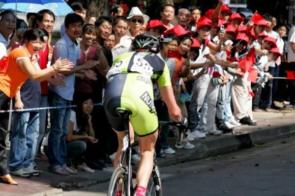 Jean Schluter (Nutrixxion Sparkasse) is cheered on by roadside fans as he heads off on his own.