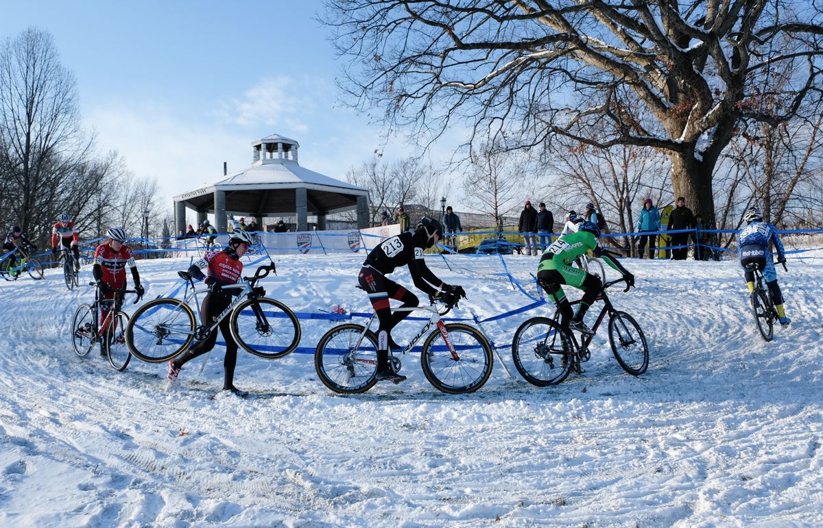 The Junior Men ride and run around the gazebo