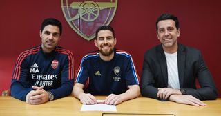 Arsenal manager Mikel Arteta and (R) Sporting Director Edu with (2ndL) new signing Jorginho at London Colney on January 31, 2023 in St Albans, England.