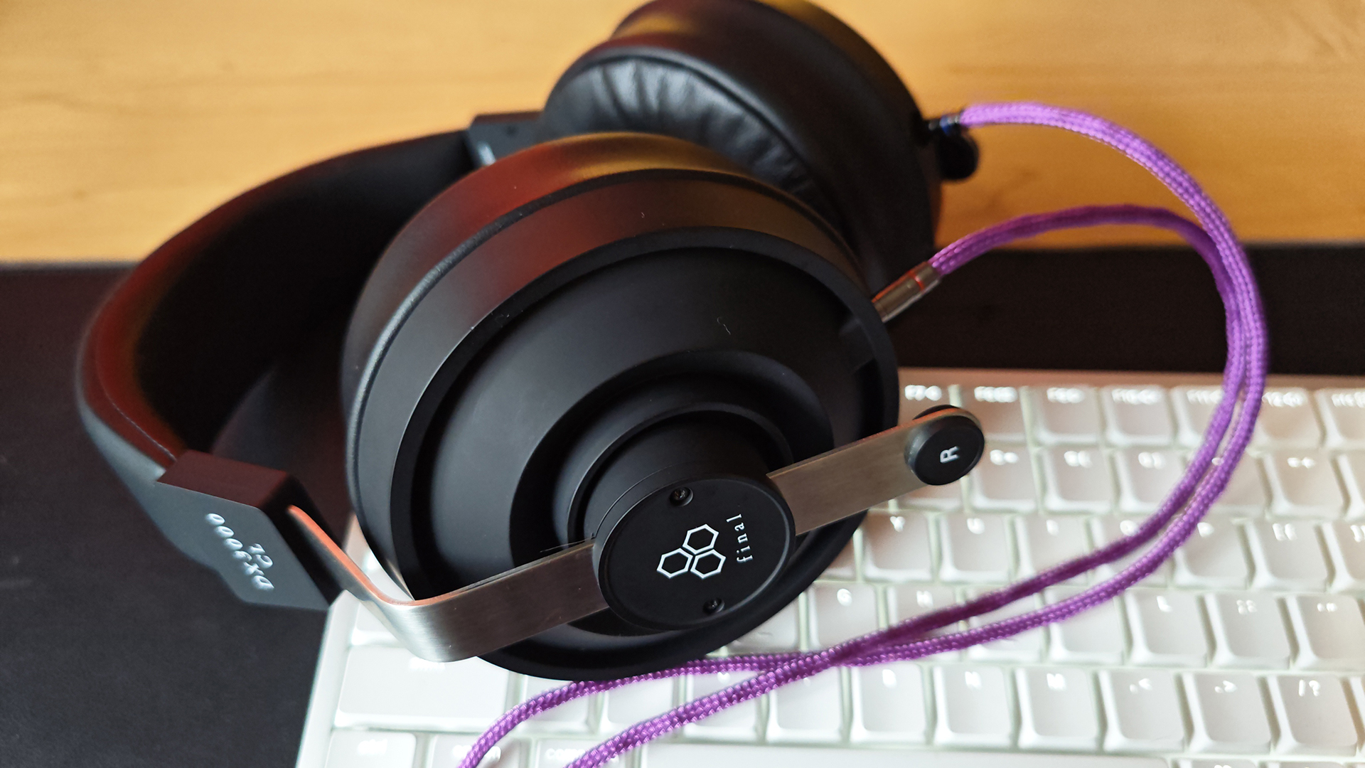 The Final DX3000CL headphones with purple cables.
