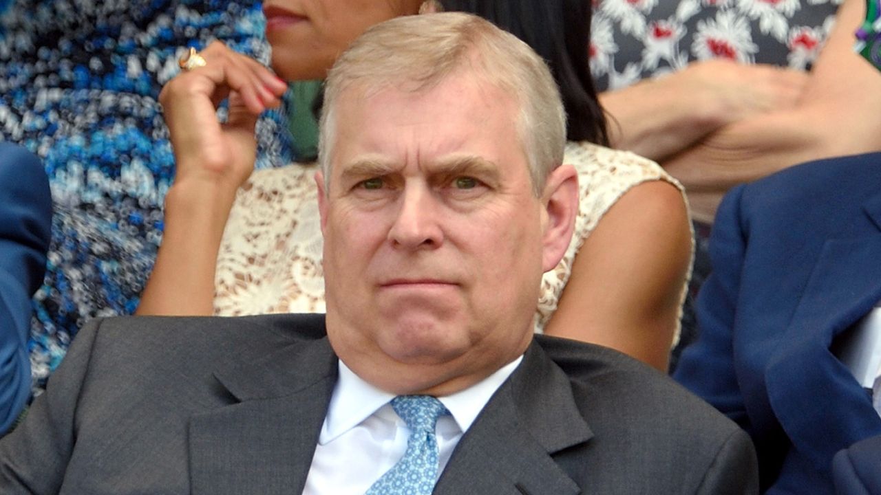 Prince Andrew wears a suit and tie at Wimbledon