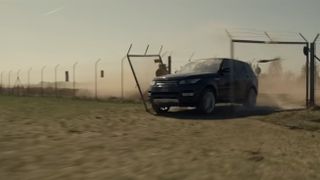 A car breaking through a fence in Tom Clancy's Jack Ryan season 4