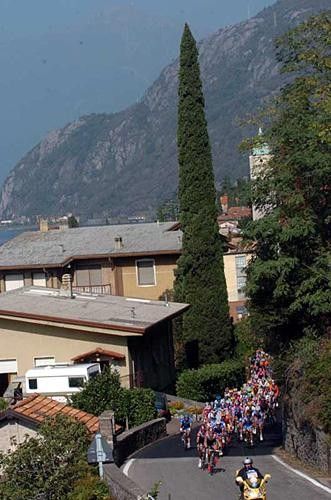 The peloton weaves in and out of towns by Lake Como