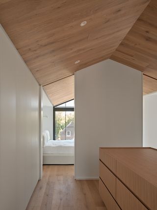interior with timber pitched roof ceiling at Everden house by archollab