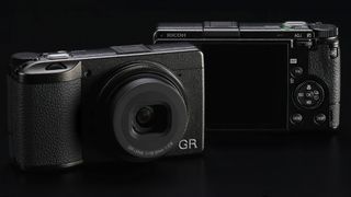 Ricoh GR III HDF cameras on a black background