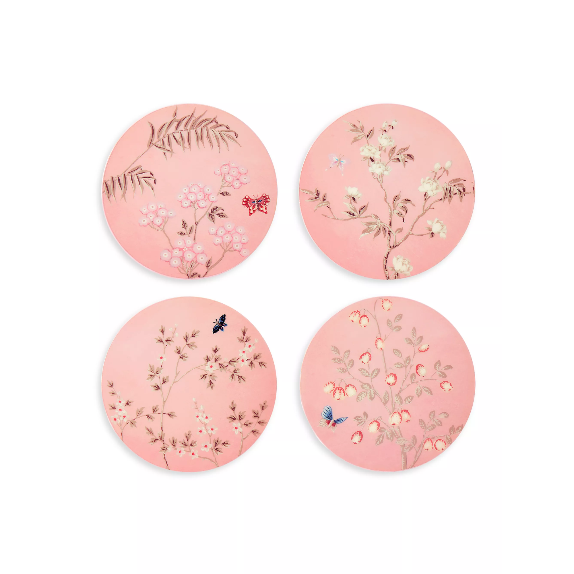 four pink coasters with floral motifs