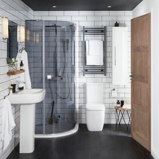 small bathroom with white subway tile finish
