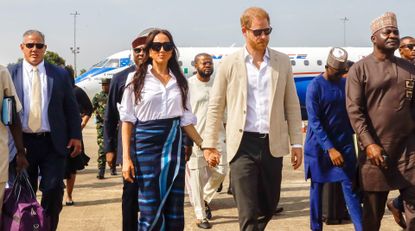 Prince Harry, Duke of Sussex and Meghan, Duchess of Sussex arrive at the Lagos airport for Official State Welcome on May 12, 2024 in Lagos, Nigeria.