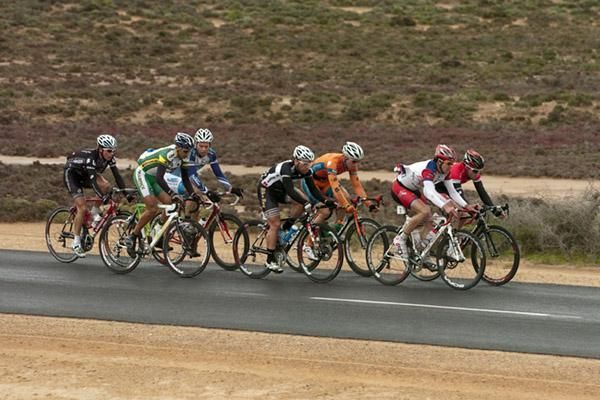 The leading group of seven riders with around a one minute advantage over the peloton on the flat lands near Nyah West.