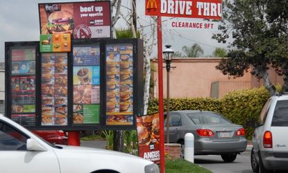 The McDonald's drive through line has slowed as its menu has expanded. 