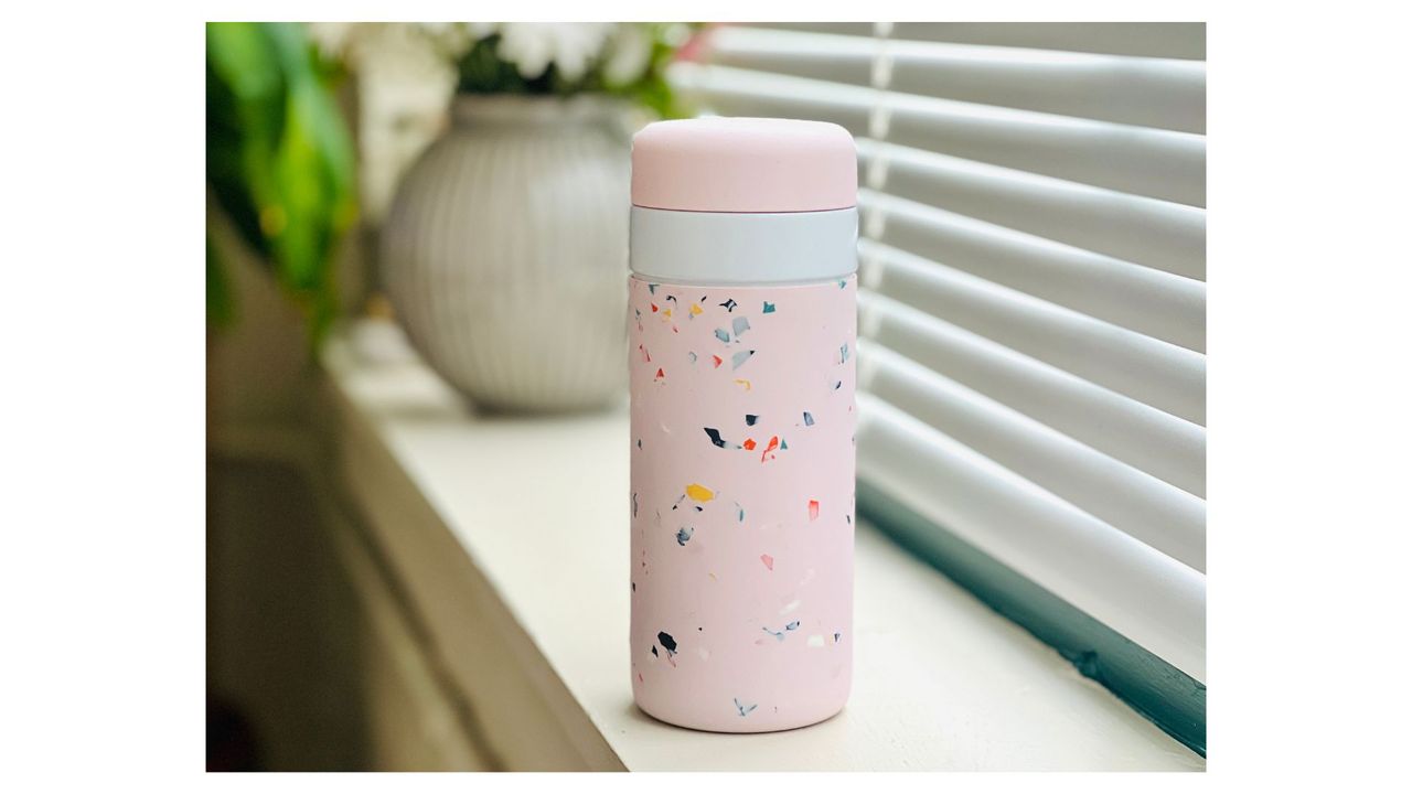 A pink speckled W&amp;P insulated bottle, for the best coffee travel mugs.