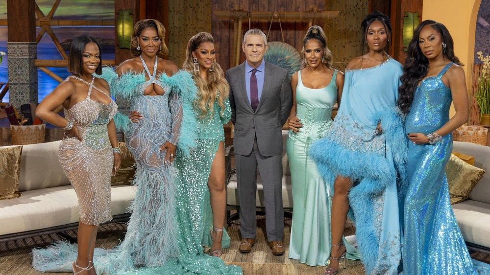 Kandi Burruss, Kenya Moore, Drew Sidors, Andy Cohen, Sheree Whitfield, Marlo Hampton and Sanya Richards Ross in a group photo for The Real Housewives of Atlanta season 15 reunion