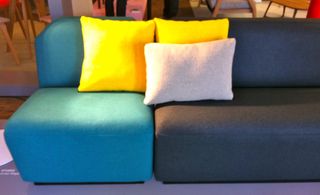 Block couch and bright coloured cushions