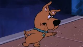 Scrappy doo looking angry and pointing