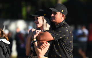 Christiaan Bezuidenhout and his wife Kristen at the 2022 Presidents Cup