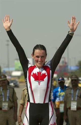 Tara Whitten (Canada) celebrates her gold medal in the Commonwealth Games time trial.