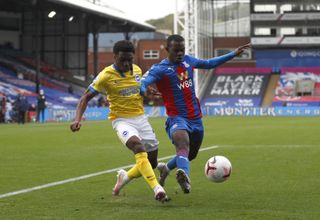 Brighton and Hove Albion’s Tariq Lamptey (left) and Crystal Palace’s Tyrick Mitchell during the Premier League match at Selhurst Park, London