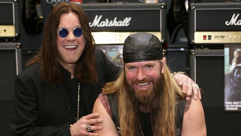Ozzy Osbourne hugging Zakk Wylde, both men smiling