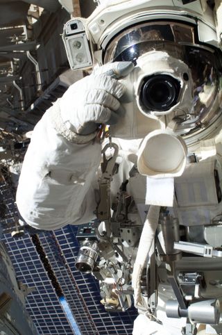 Cassidy Uses Camera Before Spacewalk Aborted Early