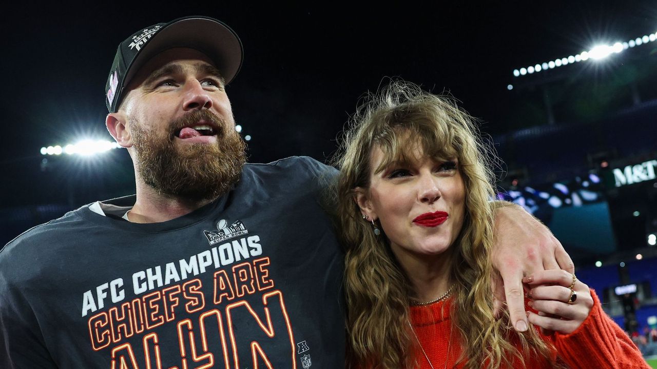 Taylor Swift and Travis Kelce attend the AFC Championship 