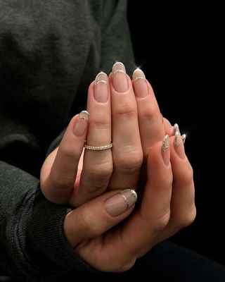 French manicure with diamond details by Queenie Nguyen