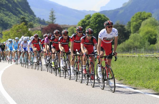 BMC's Daniel Oss and Cadel Evans are protected behind their teammates at the front of the field
