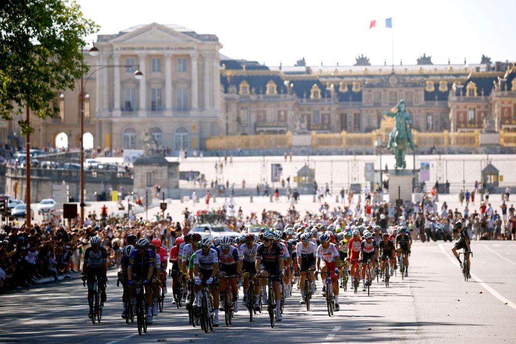 PARIS FRANCE JULY 18 The Peloton passing in front of Louis XIV statue at The Palace of Versailles in Yvelines during the 108th Tour de France 2021 Stage 21 a 1084km stage from Chatou to Paris Champslyses LeTour TDF2021 on July 18 2021 in Paris France Photo by Chris GraythenGetty Images