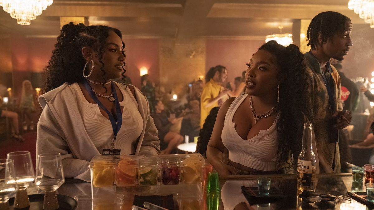 Aida Osman and KaMillion as Shawna and Mia at a bar in Rap Sh!t season 2