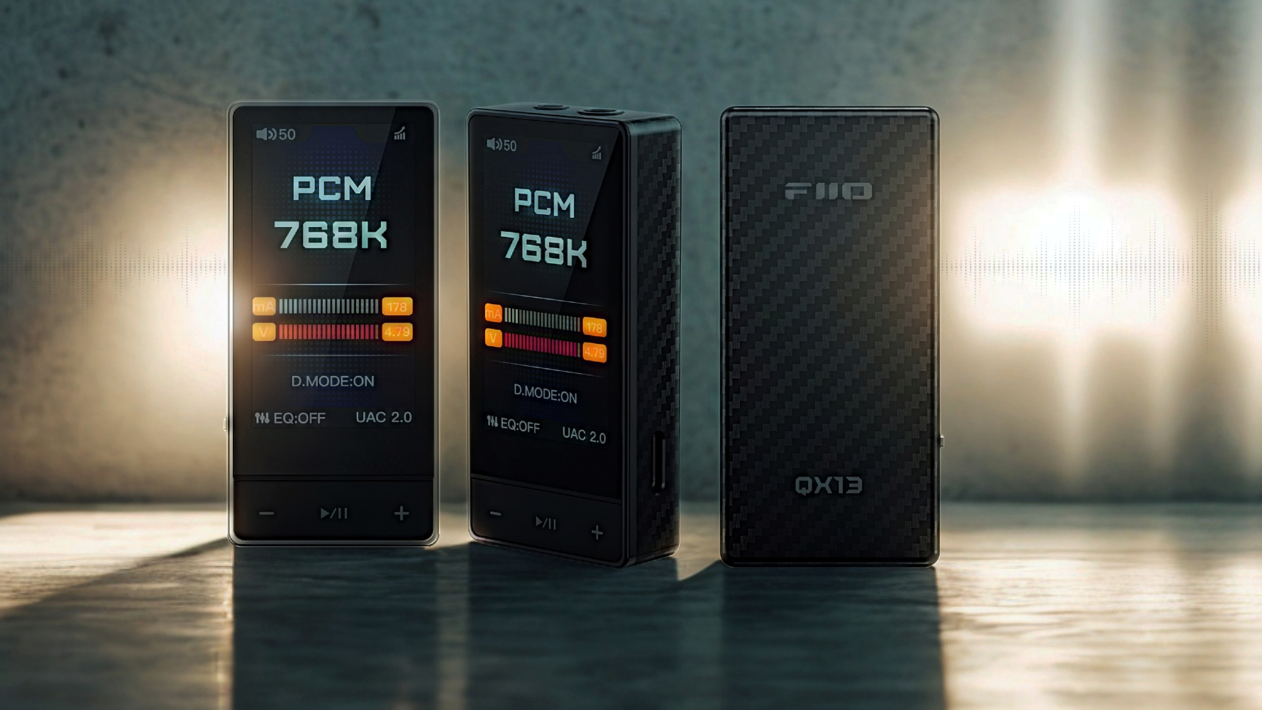 FiiO QX13 on a gray table