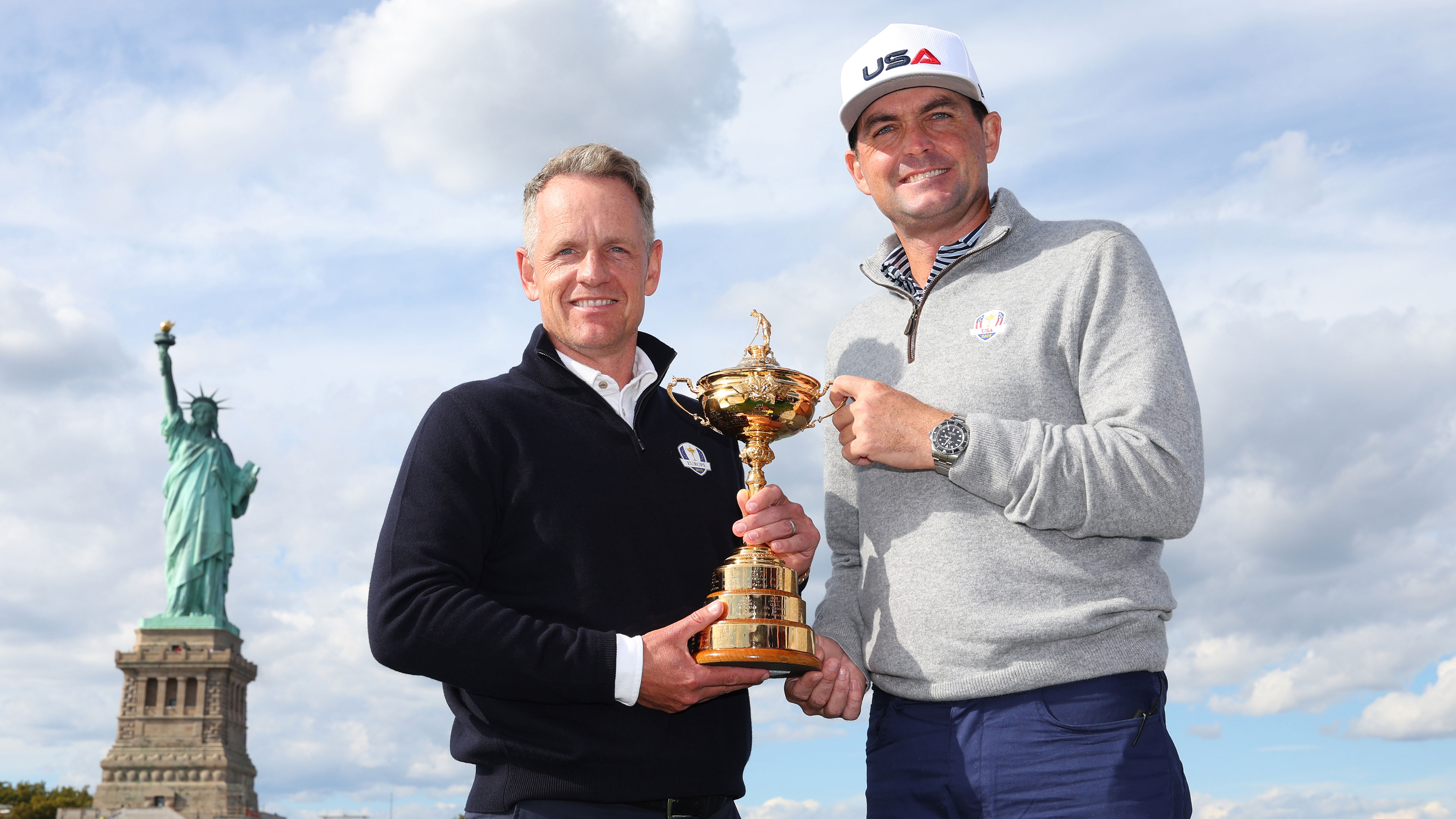 Luke Donald and Keegan Bradley pose with the Ryder Cup trophy in New York
