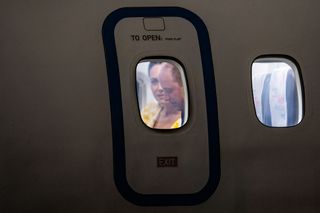 Prince William and Kate Middleton on a plane