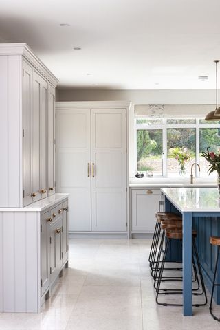 Herringbone shaker kitchen in light grey