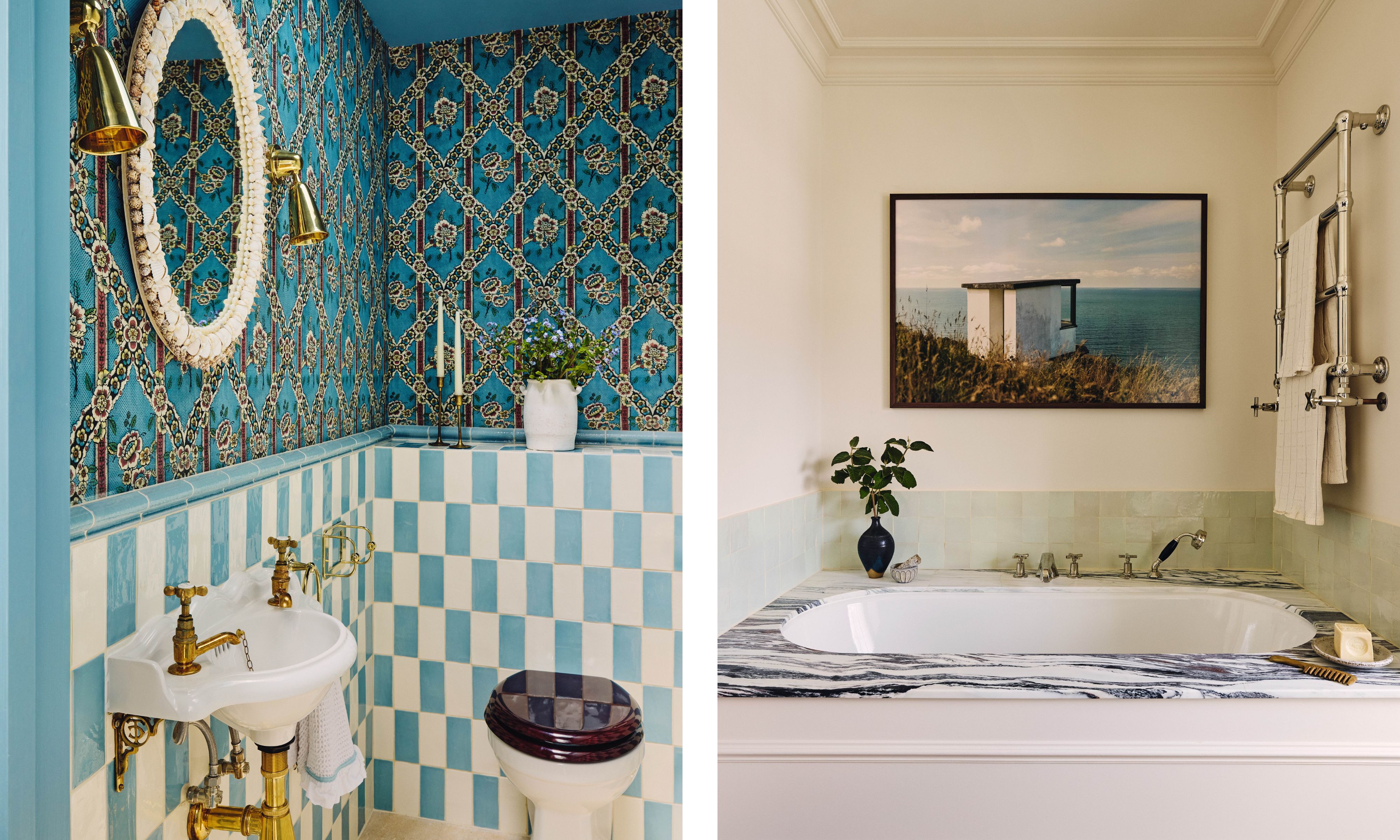 A split image of two bathrooms. On the left is a small small powder room with blue wallpaper and checkered tiles in blue and white. It has brass fixtures and a shell-framed mirror with brass lights either side. On the right is a built in bath with a mrable surround and pale green zellige tiles A coastal photograph hangs above, and a chrome towel rail is mounted nearby.