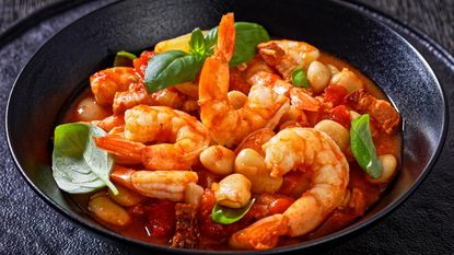 Prawn and cannellini beans in a dish