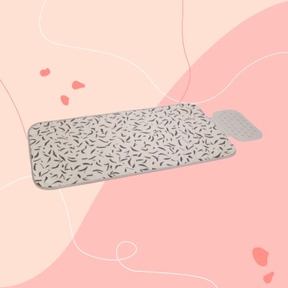 Ironing mat on pink graphic background