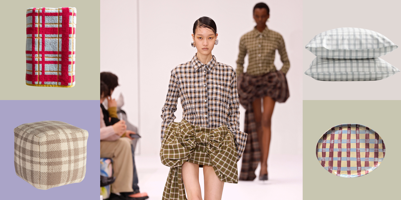 two models walk a runway in plaid outfits surrounded by plaid items