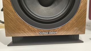 Sonus Faber Lumina II Amator standmount speakers close up on bottom of bass drive unit and logo