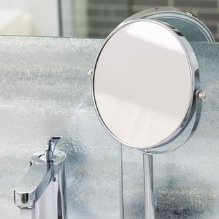 Magnifying mirror on a bathroom sink